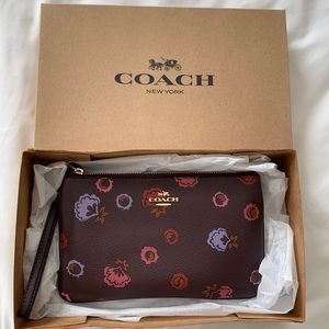 COACH Floral wristlet